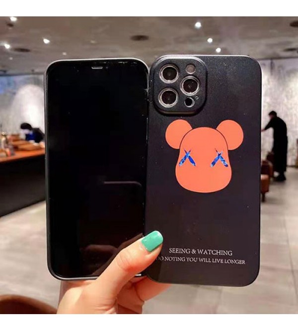 カウズ/KAWS ブランド iphone se 第3世代/13/13 pro/13 pro maxケース ハンドバンド付き 韓国風 ホルダー付 個性潮 iphone x/xr/xs/xs maxケース 落下防止 ファッション ins風 iphone 11/11 pro/11 pro maxケース かわいい iphone x/8/7 plusケース大人気