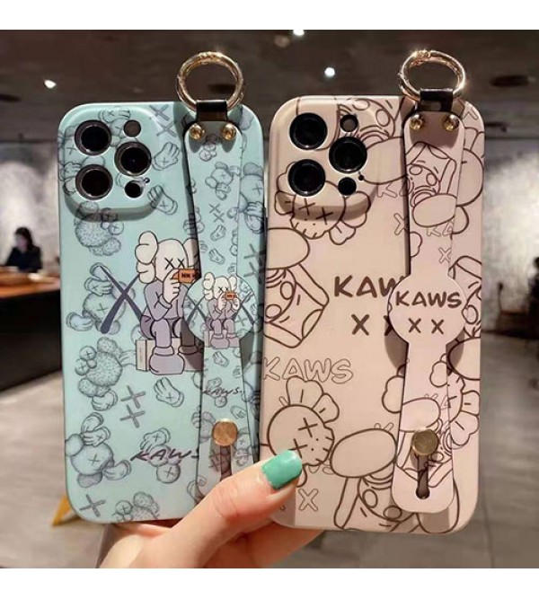 カウズ ブランドiphone13/12pro max/12 mini/12 pro maxケース ハンドバンド付き 韓国風 ホルダー付 KAWS 個性潮 iphone x/xr/xs/xs maxケース 落下防止 ファッション ins風 iphone 11/11 pro/11 pro maxケース かわいい iphone x/8/7 plusケース大人気