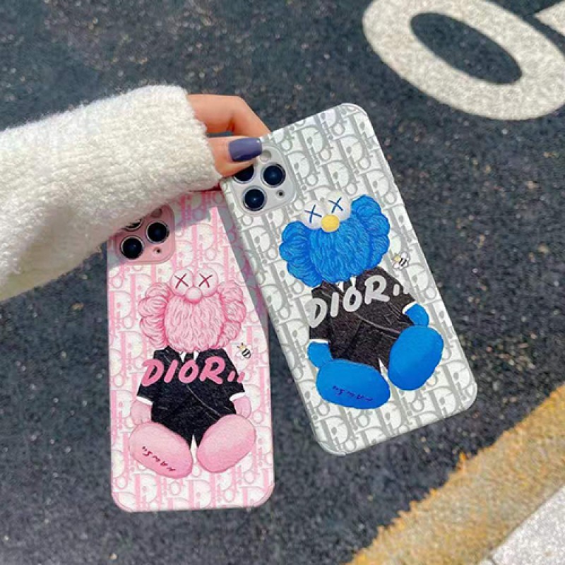 カウズ ブランドiphone13/12pro max/12 mini/12 pro maxケース ハンドバンド付き DIOR 韓国風 ホルダー付 KAWS 個性潮 iphone x/xr/xs/xs maxケース  ins風 iphone 11/11 pro/11 pro maxケース かわいい iphone x/8/7 plusケース大人気