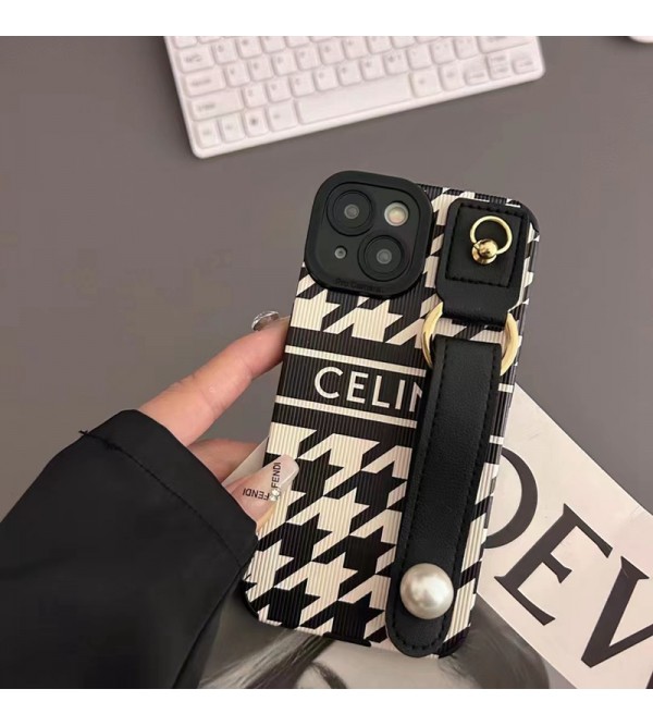 Celine セリーヌ ハイブランド iphone14/14 pro/14 pro maxケース ハンドバンド付 モノグラム レザー製 ジャケット型 リング付 アイフォン14プロ マックス/14プロ/14/13/12/11/x/xs/xrカバー 黒白色 ファッション メンズ レディース