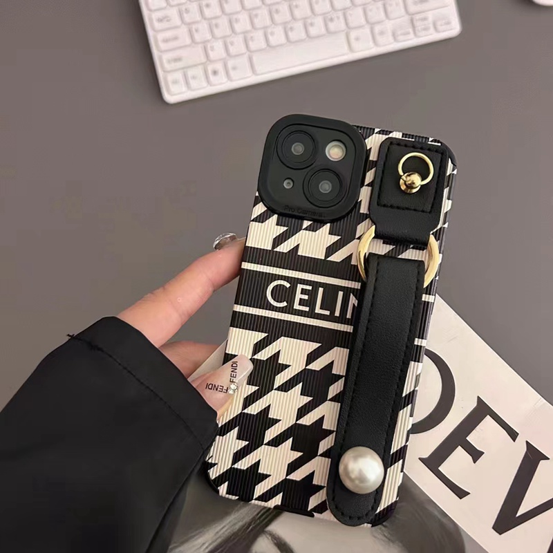 Celine セリーヌ ハイブランド iphone14/14 pro/14 pro maxケース ハンドバンド付 モノグラム レザー製 ジャケット型 リング付 アイフォン14プロ マックス/14プロ/14/13/12/11/x/xs/xrカバー 黒白色 ファッション メンズ レディース