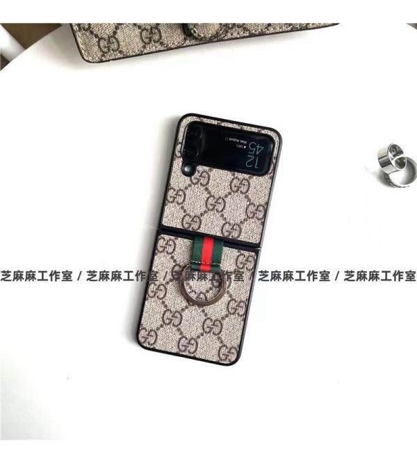 Gucci グッチ ブランド Galaxy z flip 4 5Gスマホケース かわいい モノグラム 折りたたむ式 ストラップ付き 便利 ギャラクシーZ Flip3カバー GG 保護 ファッション セレブ愛用 激安 レディース